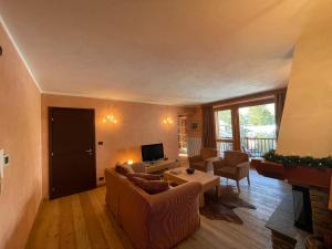 A television and/or entertainment centre at Suite - La Casa del Maestro