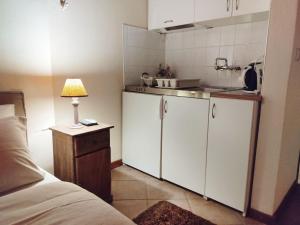 Kuchyň nebo kuchyňský kout v ubytování Klio Guesthouse