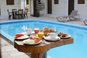 The swimming pool at or close to Pousada Maravelas By OM