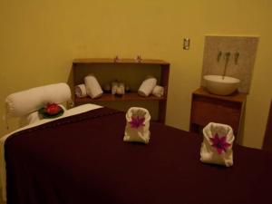 A bed or beds in a room at Holiday Inn Puebla Finsa, an IHG Hotel