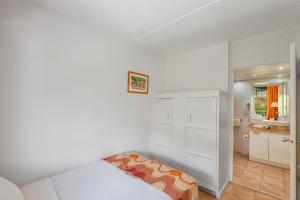 Postel nebo postele na pokoji v ubytování Belair Beach Hotel