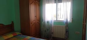 Postel nebo postele na pokoji v ubytování Casas Rurales Tiscar