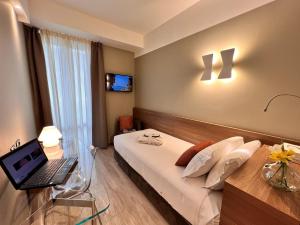 TV a/nebo společenská místnost v ubytování Best Western Hotel City