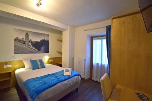 A bed or beds in a room at Affittacamere da Annarè