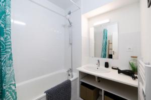 Koupelna v ubytování My Cozy Flat Blagnac - T2 - Free Parking - Terrasse - Jardin + 17 fotografií