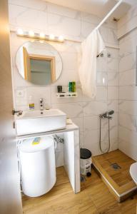 Ванна кімната в Dreamy Apartment City Center 7 thesbnbgr