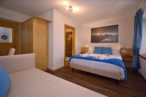 A bed or beds in a room at Affittacamere da Annarè
