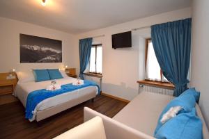 A bed or beds in a room at Affittacamere da Annarè