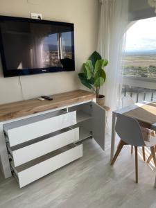 TV a/nebo společenská místnost v ubytování Four Seasons