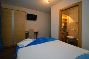 A bed or beds in a room at Affittacamere da Annarè