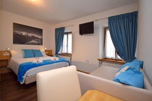 A bed or beds in a room at Affittacamere da Annarè