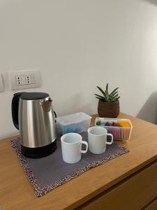 Coffee and tea making facilities at Casa Giulietta - ombrellone e 2 lettini inclusi