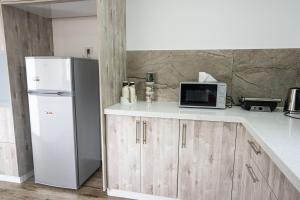 Kuchyň nebo kuchyňský kout v ubytování Bitra hermon suites