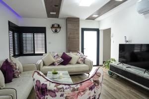 Posezení v ubytování Bitra hermon suites