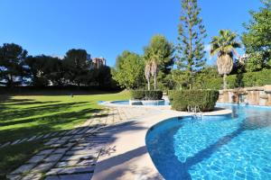 The swimming pool at or close to Benibeach 3-2-B Apartment Poniente Beach