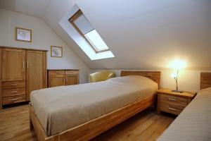 Postel nebo postele na pokoji v ubytování Feriendorf Papillon Wohnung 06-7
