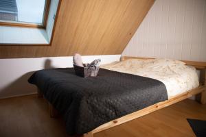 Postel nebo postele na pokoji v ubytování Uniq Home