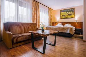 Posteľ alebo postele v izbe v ubytovaní Villa Skomanda
