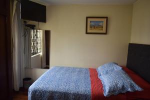Postel nebo postele na pokoji v ubytování Hostal Donde Alberto