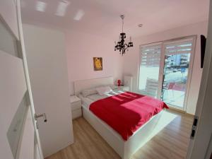 Ένα ή περισσότερα κρεβάτια σε δωμάτιο στο Balticstars apartments polanki 2 bedrooms