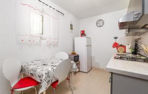 Kuchyňa alebo kuchynka v ubytovaní Apartment Rojal