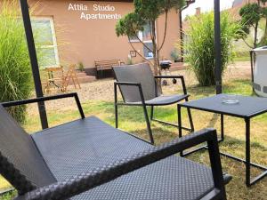 A garden outside Attila Studio Apartments