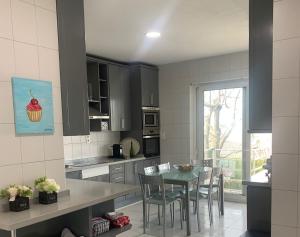 A kitchen or kitchenette at Villa Mare a los pies de Sierra Nevada