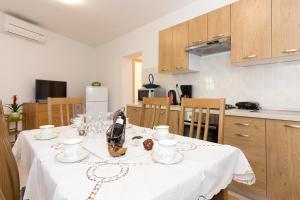 Kuchyň nebo kuchyňský kout v ubytování Apartman Andrea