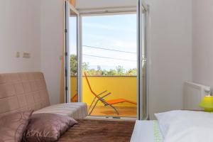 Postel nebo postele na pokoji v ubytování Apartman Andrea
