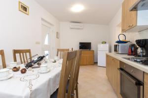 Kuchyň nebo kuchyňský kout v ubytování Apartman Andrea