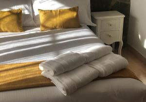 A bed or beds in a room at El valle de Lis