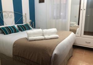 A bed or beds in a room at El valle de Lis