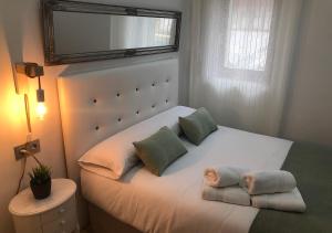 A bed or beds in a room at El valle de Lis