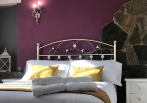 A bed or beds in a room at El valle de Lis
