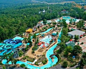 an aerial view of a water park at Secluded Home with Mini Waterfall and a Creek in Hot Springs in Hot Springs