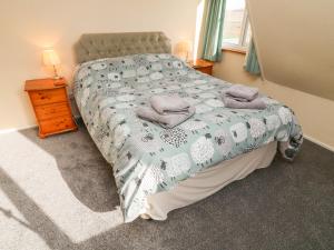 Ένα ή περισσότερα κρεβάτια σε δωμάτιο στο Netherscar