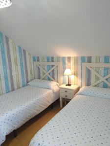 Posteľ alebo postele v izbe v ubytovaní Chalet Playa del Sable + 14 fotografií