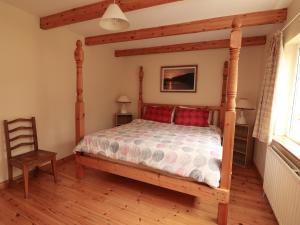 Postel nebo postele na pokoji v ubytování The Lodge