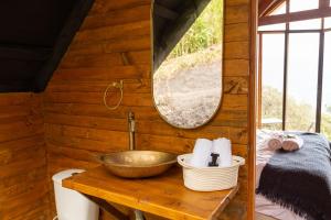 Postel nebo postele na pokoji v ubytování Cúspide Lodge - Choachí