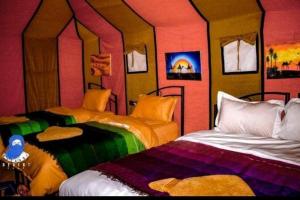 Postel nebo postele na pokoji v ubytování Desert Romantic Camp