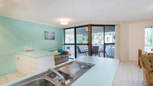 A kitchen or kitchenette at Enjoy the Water Views from Spacious Balcony at Karoonda Sands