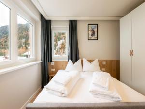 Voodi või voodid majutusasutuse Apartment in Zwieselstein comfort 61m² toas