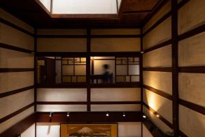 a room with a mirror and a painting on the wall at Ryusuke25 - Vacation STAY 71742v in Komatsu