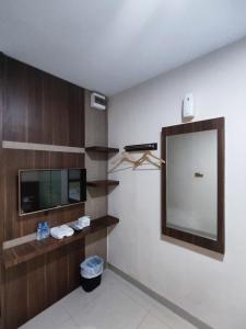 Salle de bains dans l'établissement Hotel Morena Batam