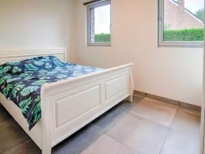 Voodi või voodid majutusasutuse Holiday Home in Bocholt with Garden toas