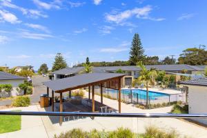 an overhead view of a house with a swimming pool at Seaside Holiday Resort in Fingal Bay