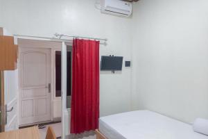 Postel nebo postele na pokoji v ubytování KoolKost @ Jalan Tirto Agung (Minimum Stay 6 Nights)