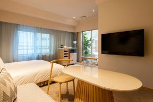 En TV eller et underholdningssystem på hotel hisoca ikebukuro
