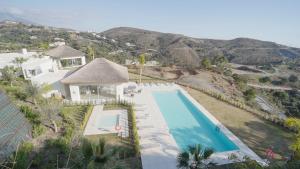 A view of the pool at Holiday in ground floor apartment in Marbella Club Hills, Benahavis or nearby