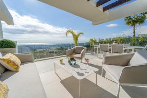 Część wypoczynkowa w obiekcie Holiday in ground floor apartment in Marbella Club Hills, Benahavis